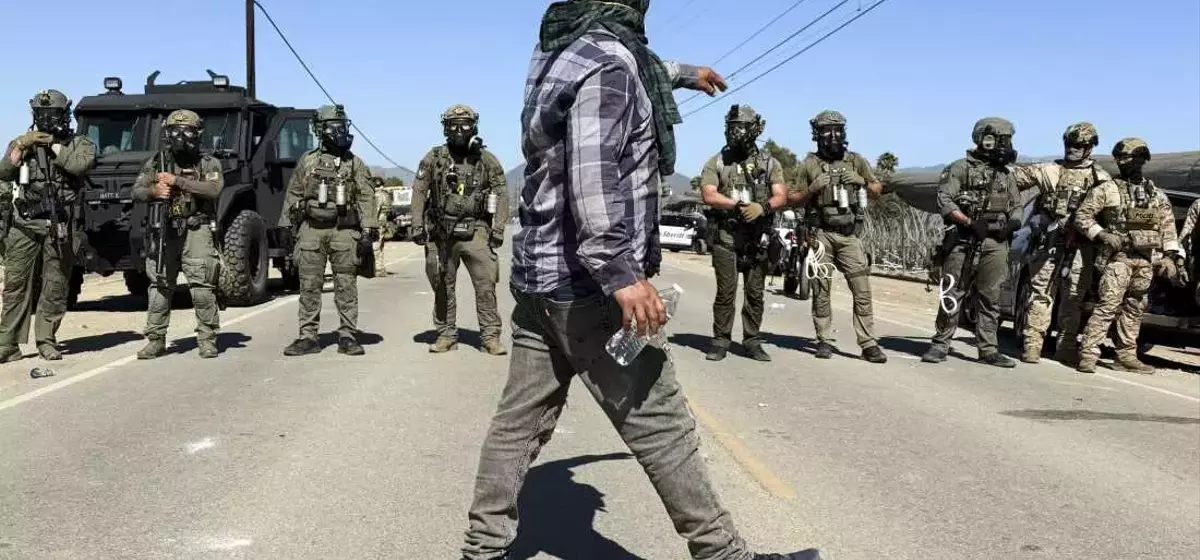 Federal Agents and Protesters Clash During Farm Raid in Southern California