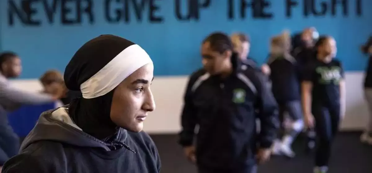Sisters Revolutionize Women's Wrestling with Faith-Based Uniforms