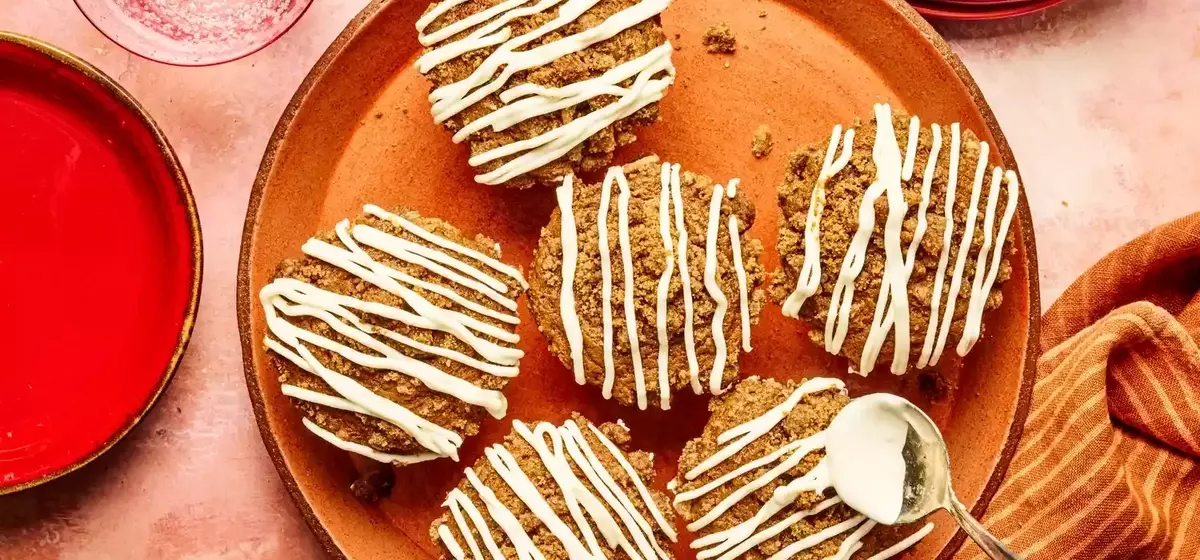 Delectable Gingerbread Muffins with Streusel Topping and Cream Cheese Glaze