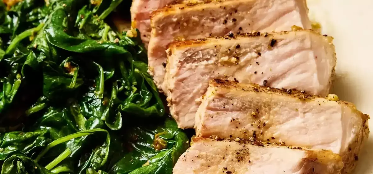 Quick One-Pan Garlic-Butter Pork Chops with Sautéed Spinach