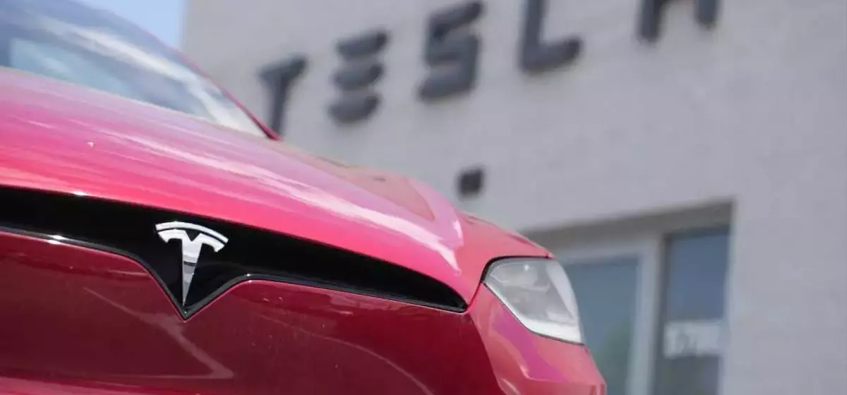 Tesla's Shifting Strategy: From EV Leader to AI and Robotics Pioneer Amidst Profit Slump