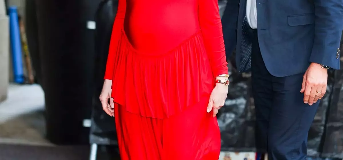 Anne Hathaway's Bold Maternity Style Debut in Red