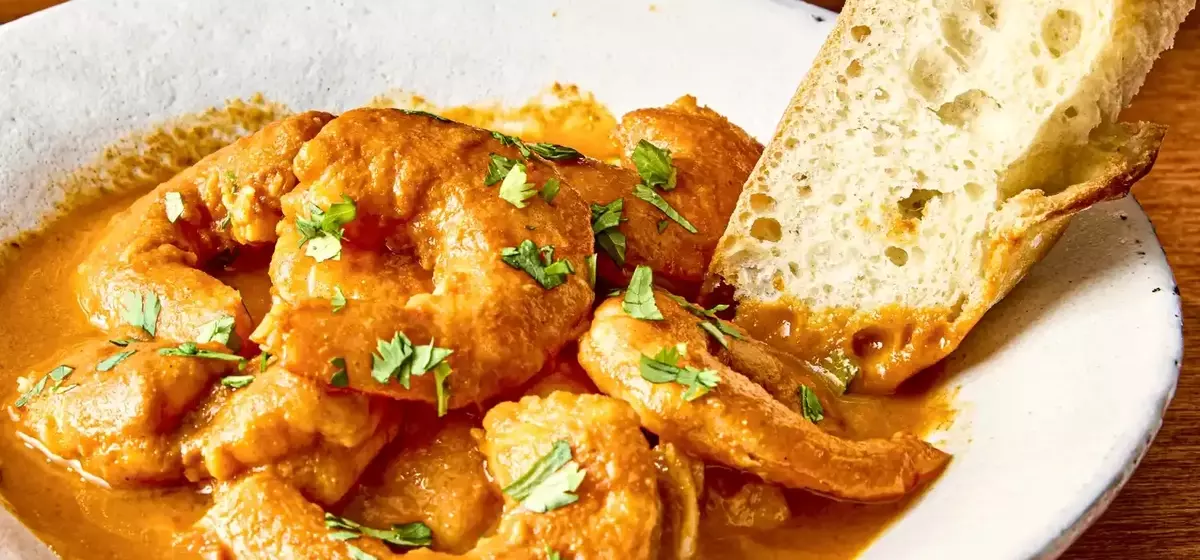 A Culinary Exploration of Shrimp and Chorizo in a Velvety Tomato Sauce