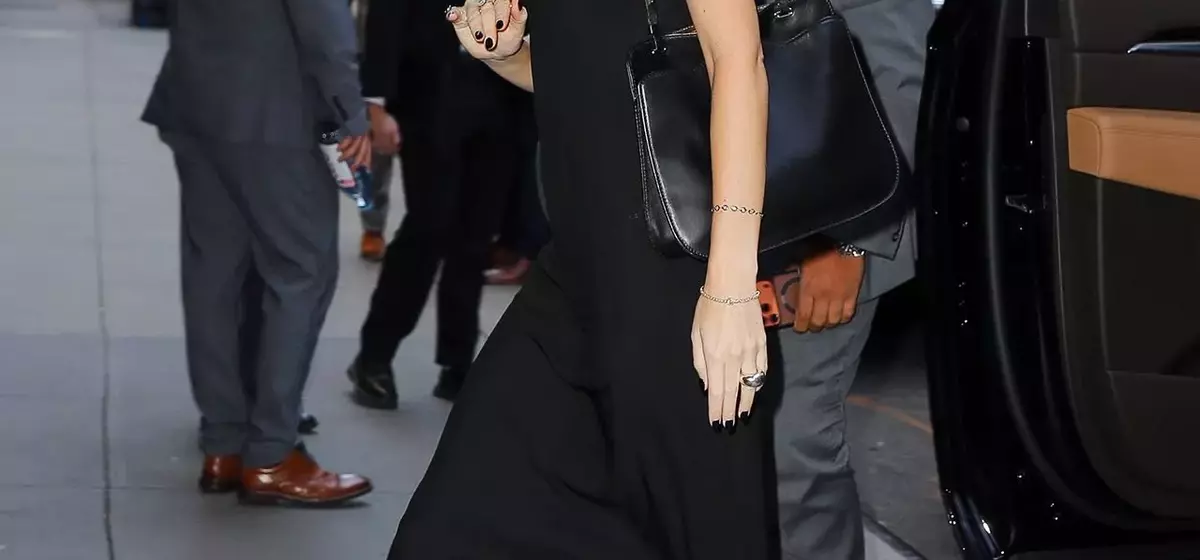 Dakota Johnson's Unexpected Summer Footwear Choice: The Wedge Flip-Flop
