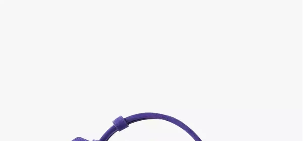 Fashion Week's Defining Trends: Purple Hues, Statement Brooches, and Inventive Styling