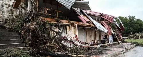 The Looming Deluge: Why Americans Underestimate Flood Risks and Underinsure