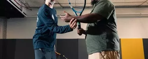 Vision Impairment No Barrier to Passionate Tennis Play