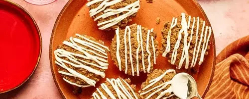 Delectable Gingerbread Muffins with Streusel Topping and Cream Cheese Glaze