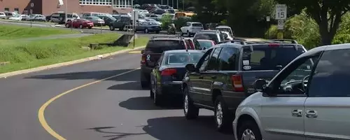 The Perplexing Phenomenon of Protracted School Pick-Up Queues