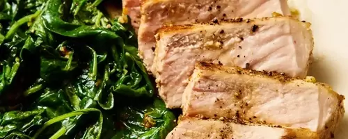 Quick One-Pan Garlic-Butter Pork Chops with Sautéed Spinach