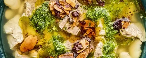 Mexican Brothy Beans with Pork, Salsa Macha, and Cilantro Pesto