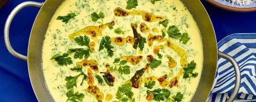 Crafting Kadhi: A Tangy and Flavorful Chickpea-Yogurt Stew