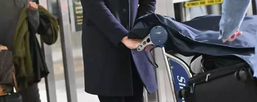 Tom Hiddleston's Impeccable Airport Style