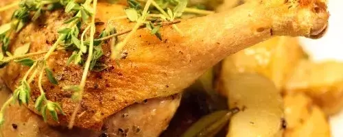 Rustic Roasted Duck Legs with New Potatoes, Sugar Snaps, and Spring Onions