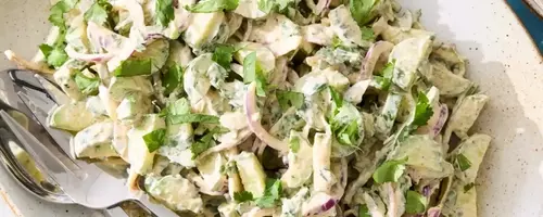 Refreshing Cucumber Salad with Spicy Yogurt Dressing: A Culinary Journey from Childhood Snacks