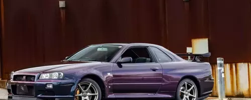 Rare 1999 Nissan Skyline GT-R V-Spec in Midnight Purple with Low Mileage Heads to Auction