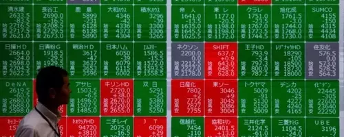 Global Markets Stumble as Fed's Inflation Stance and Oil Price Drops Reshape Investor Outlook