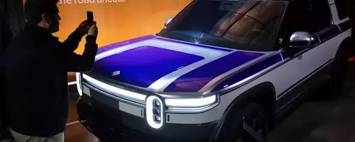 Rivian Shares Dip After Major Stock Offering, Despite Strong Q2 Revenue Projections