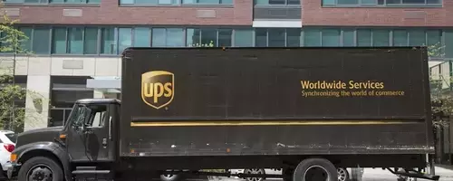 UPS Shares Gain Momentum Amidst Contract Scrutiny and Strategic Expansion