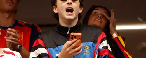 Celebrity Style at the World Cup: Chalamet's Sporty Chic vs. Beckham's Classic Elegance