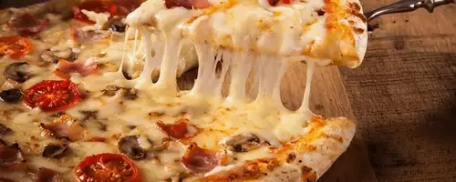 Domino's Pizza Exceeds Revenue Estimates Despite Earnings Miss in Q2