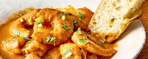 A Culinary Exploration of Shrimp and Chorizo in a Velvety Tomato Sauce