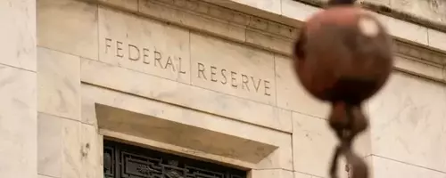 Fed Official Urges Swift Rate Hike Amid Stubborn Inflation