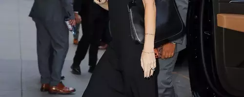 Dakota Johnson's Unexpected Summer Footwear Choice: The Wedge Flip-Flop